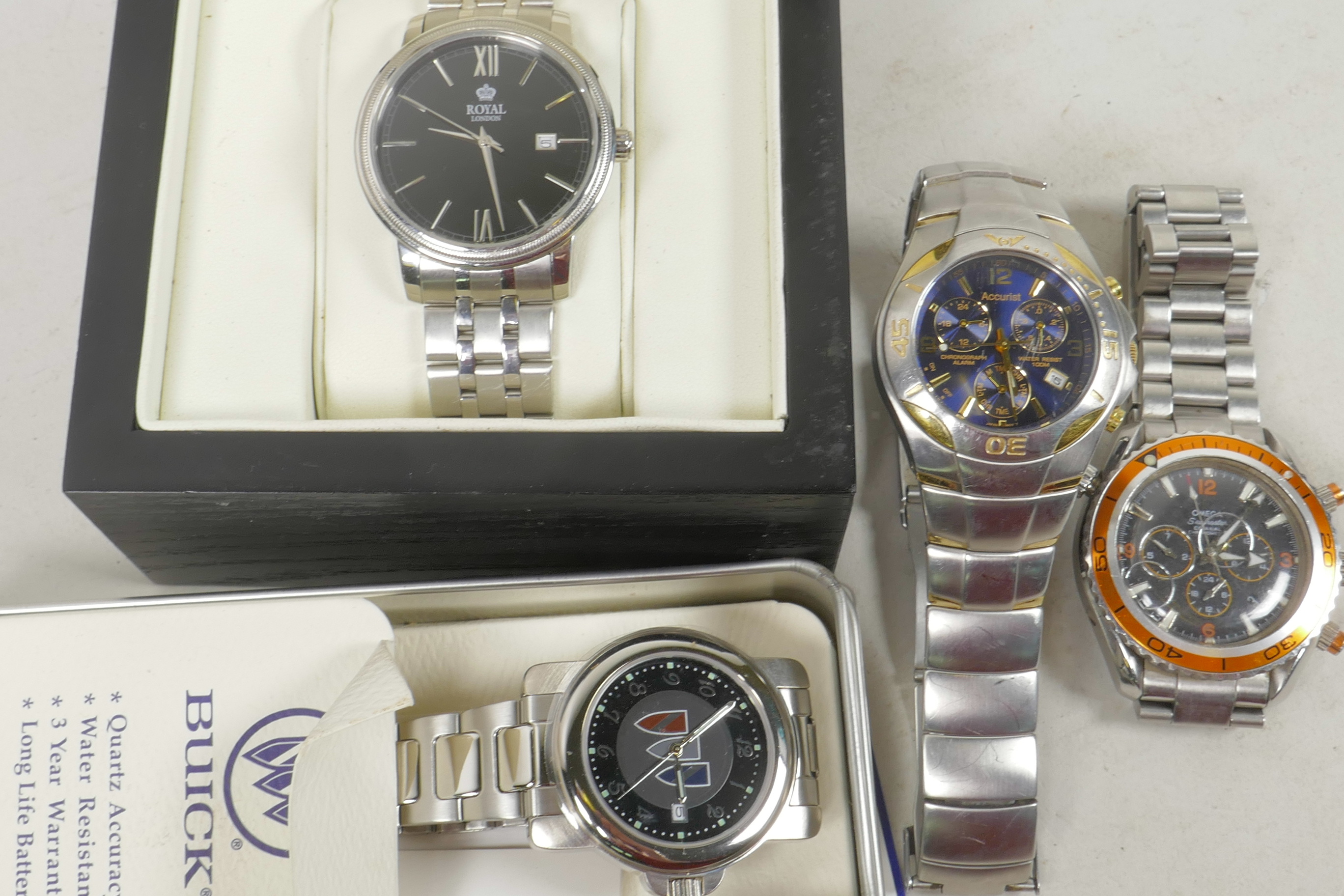 Four gentleman's stainless steel wristwatches