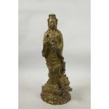 A Chinese bronze of Quan Yin and a dragon set with semi-precious stones, 13½" high