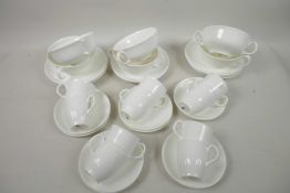 Ten Wedgwood 'Galaxy White' porcelain coffee cups and saucers, and eight bowls, one A/F with saucers