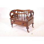 A mid C19th rosewood canterbury, with single drawer and lyre shaped ends, raised on turned