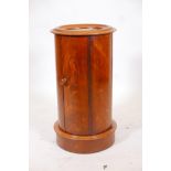A C19th mahogany cylinder shaped pot cupboard with inset marble top and single door, 16" diameter