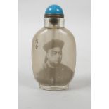 A Chinese reverse decorated snuff bottle depicting an emperor, inscription verso, 3½" high