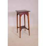 An Arts and Crafts mahogany plant stand, the top inlaid with geometric pattern in various woods,