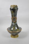 An olive green drip glazed pottery vase with ormolu mounts and details, 13" high