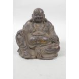 A Chinese bronzed metal rotund Buddha with gilt patina, 5" high