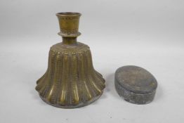 An C18th/19th Islamic brass hookah base together with a Bidri work tobacco box, 6½" high