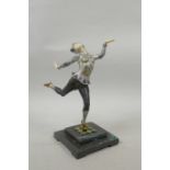 An Art Deco style cold painted bronze figure of a dancing woman with carved ivorine hands and