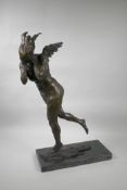 A bronze of a nude female angelic figure, 24" high, indistinctly signed