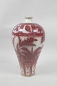 A Chinese red and white porcelain meiping vase decorated with Asiatic flora, 9" high