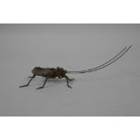 A Japanese Jizai style bronze of a cricket with articulated limbs and antenna, 6" long