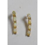 A pair of silver gilt and opal drop earrings, 1" long