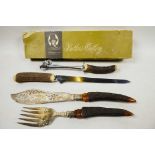 A George Butler of Sheffield carving knife set with stag horn handles in the original box, knife 14"