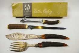 A George Butler of Sheffield carving knife set with stag horn handles in the original box, knife 14"