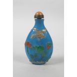 A Chinese Peking glass snuff bottle with raised and painted decoration of birds and flowers, 2