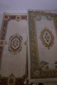 A Chinese deep pile wool rug, and another with similar pattern, 72" x 38"