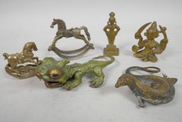Six small bronze figures, a salamander, 3" long, a dragon lizard, two rocking horses and two
