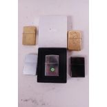 Five Zippo standard size pocket lighters in a presentation box