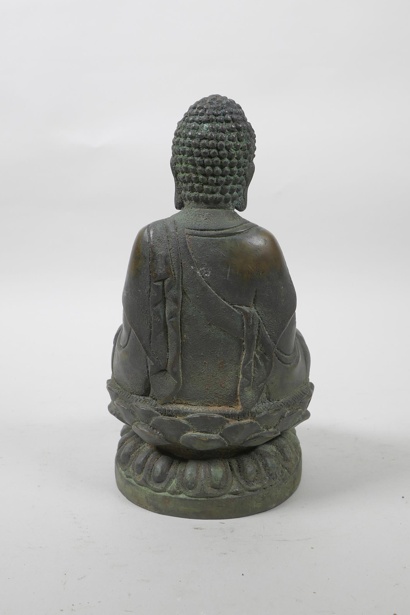 A bronze of Buddha seated on a lotus throne with verdigris patina, 8" high - Image 2 of 3