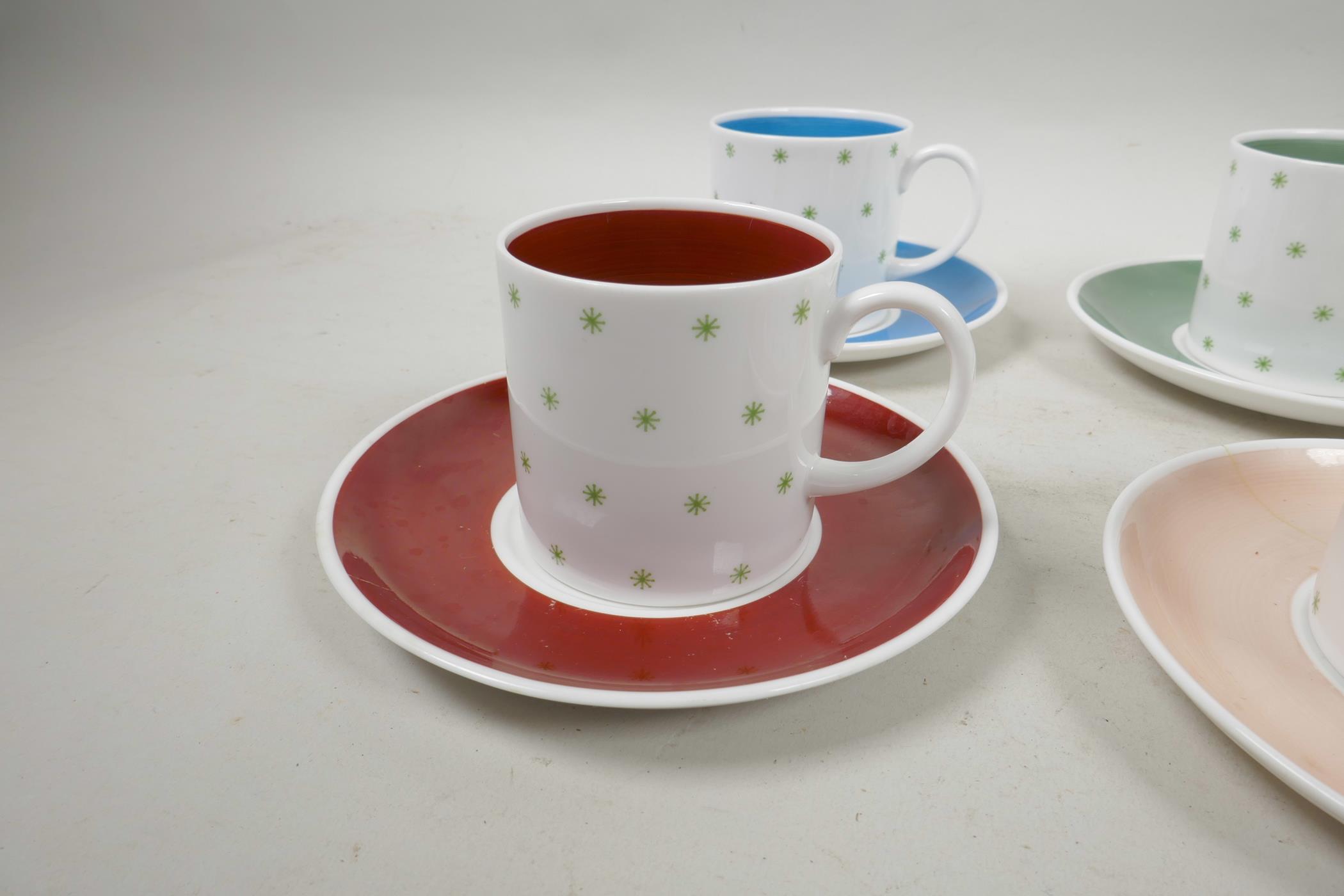 A Susie Cooper six cup and saucer coffee set with green star decoration, A/F, 5½" diameter - Image 2 of 9