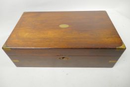 A C19th rosewood campaign writing box with brass cap corners and fitted interior