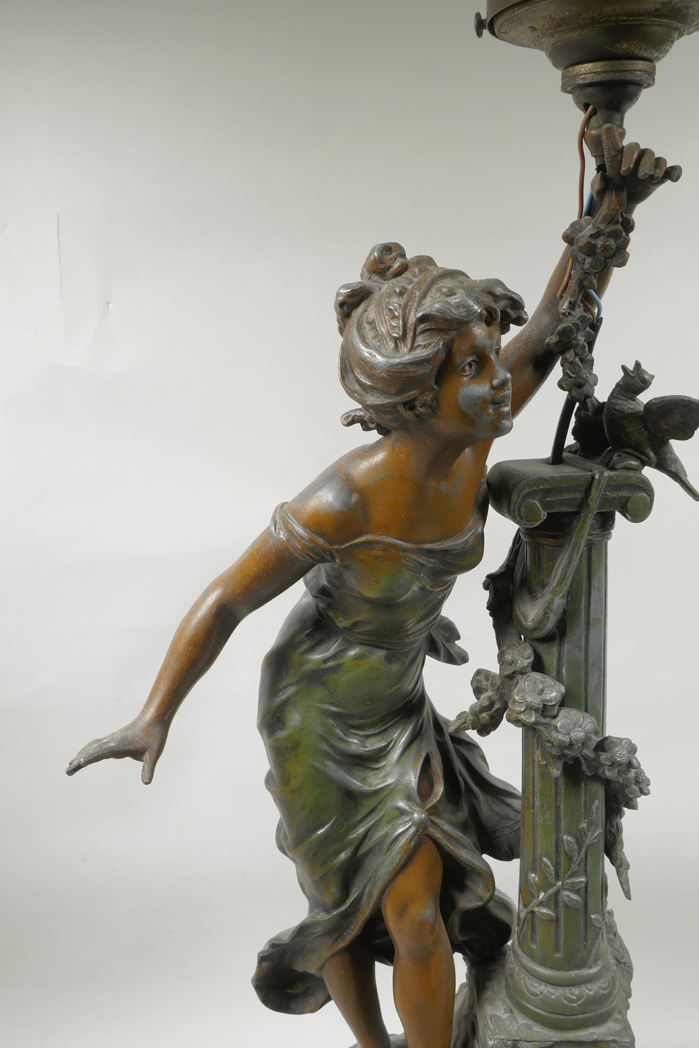 An Art Nouveau spelter lamp in the form of a lady standing by a column, after Moreau, titled ' - Image 2 of 4