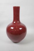 A Chinese flambe glazed bottle vase, 4 character mark to base, 14" high