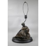 A spelter lamp in the form of the poet Horace seated on a chair, 26" high