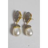 A pair of silver gilt, uncut diamond and pearl drop earrings, 1½" drop