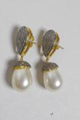 A pair of silver gilt, uncut diamond and pearl drop earrings, 1½" drop