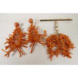 A suit of 9ct gold set red branch coral earrings and brooch