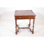 A marquetry inlaid burr walnut single drawer side table, raised on turned supports, united by shaped