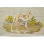 A C19th embroidery of a hound, in a mahogany frame, 27½" x 22"