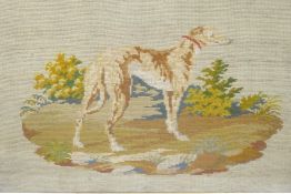 A C19th embroidery of a hound, in a mahogany frame, 27½" x 22"
