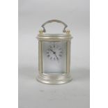 A silver plated miniature cylinder carriage clock, 3" high x 2½" diameter
