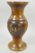 A Chinese carved hardstone vase decorated with phoenix rising from the flames and having detailed
