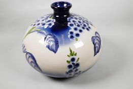 A large Florian ware Moorcroft style bulbous vase, 10½" high, 14" diameter