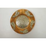 A Chinese copper dish/platter with applied white metal dragon and floral decoration, 9" diameter