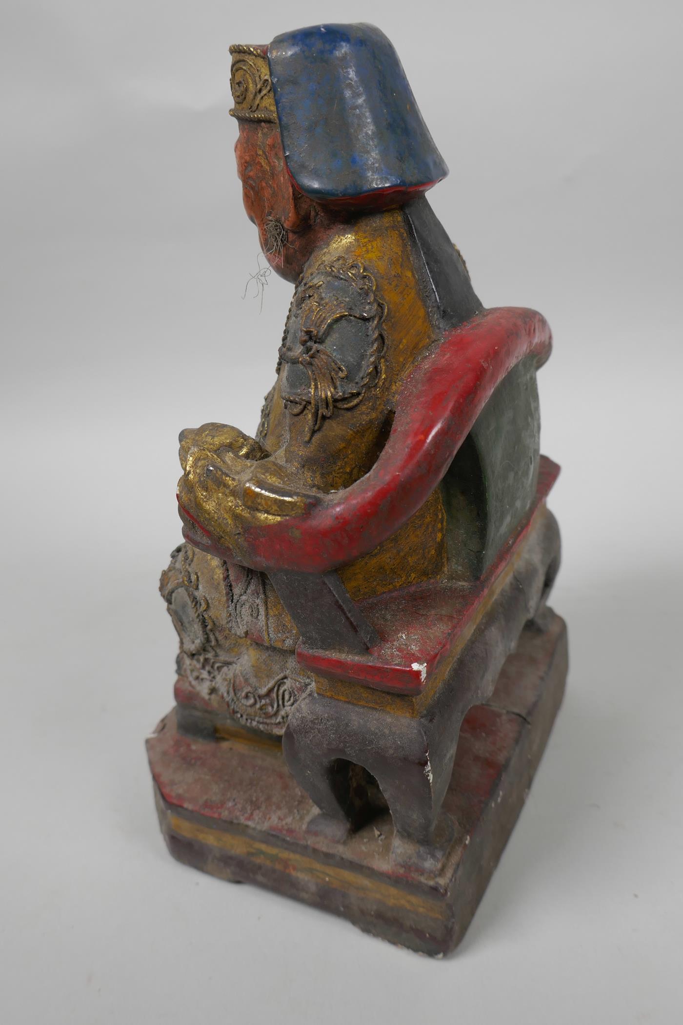 A Chinese painted wooden figure of a dignitary wearing fine robes with wired decoration, seated on a - Image 4 of 5