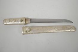 A replica Japanese short sword, the scabbard embossed with erotic scenes, 15½" long