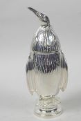 A novelty silver plated sugar sifter in the form of a penguin, 7½" high