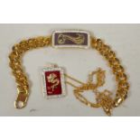 A gilt metal curb link bracelet with elaborate enamel and crystal decorated panel together with a