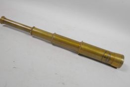 A three draw brass telescope, 6" long closed