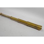 A three draw brass telescope, 6" long closed