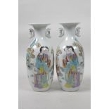 A pair of Chinese Republic porcelain two handled vases decorated with two women in a landscape,