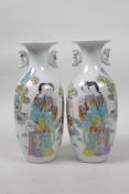 A pair of Chinese Republic porcelain two handled vases decorated with two women in a landscape,