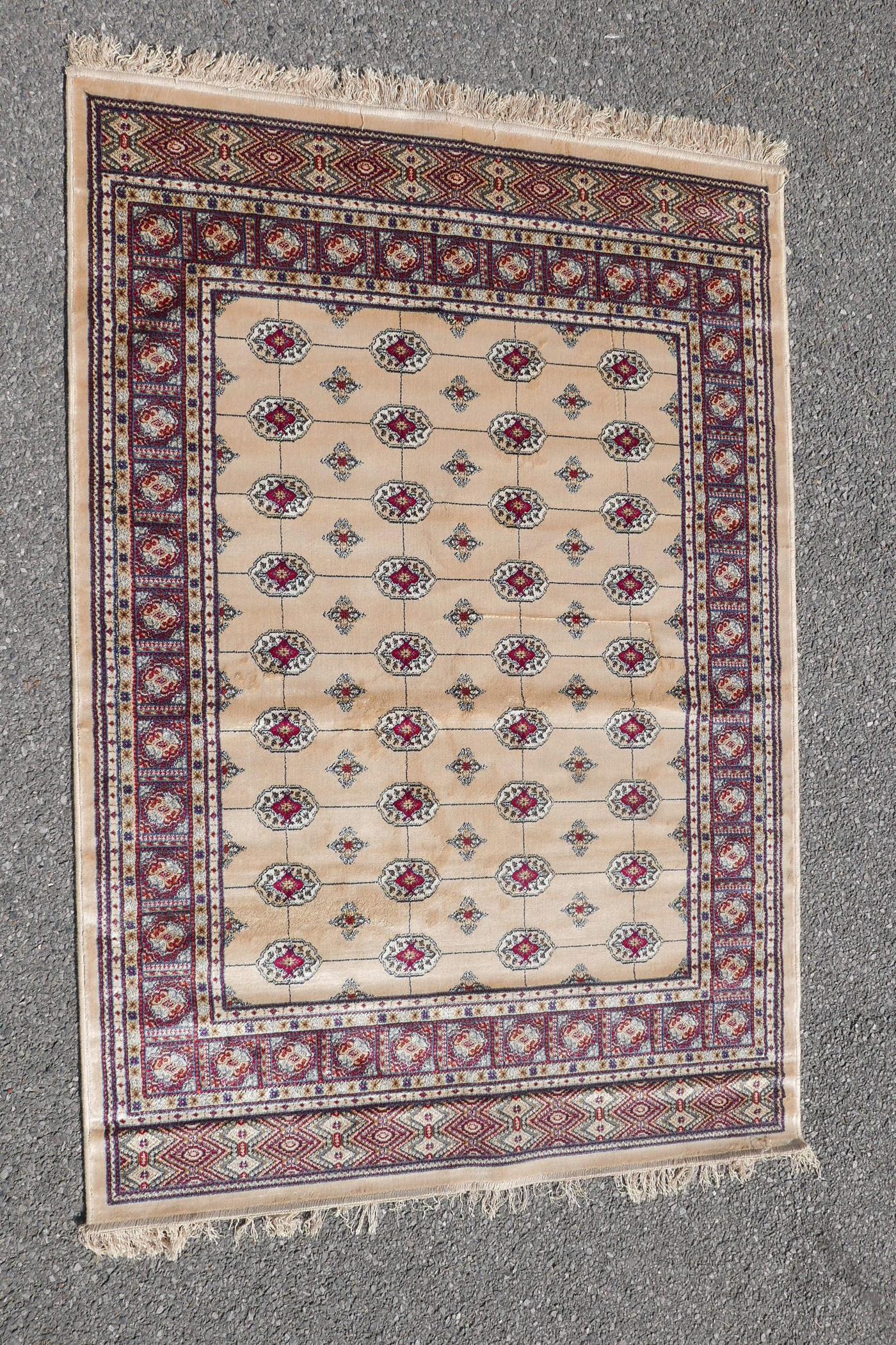 A gold ground Kashmiri rug with a Bokhara design, 46" x 66" - Image 2 of 4