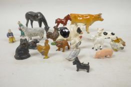 A quantity of miniature farmyard animals including Britains