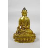 A Sino-Tibetan gilt bronze of Buddha seated on a lotus throne, impressed double vajra mark to