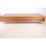 A contemporary veneered low media table/coffee table with a fall front, 60½" x 23½", 12" high