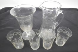 An engraved glass celery vase, 8½" high, together with an engraved lemonade jug and four tumblers